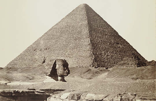 Image may contain: Photograph, Ecoregion, Black, Sky, Pyramid.