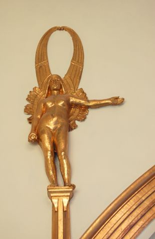 A winged female figure was a popular motif in European Art Nouveau. The artists were fascinated by both symbolism and the aesthetics of the female body.