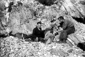 The last stop in Novaya Zemlya was at the Gribovii Fjord. In this picture, three of the expedition participants are enjoying a coffee break in the lee of a rock face.