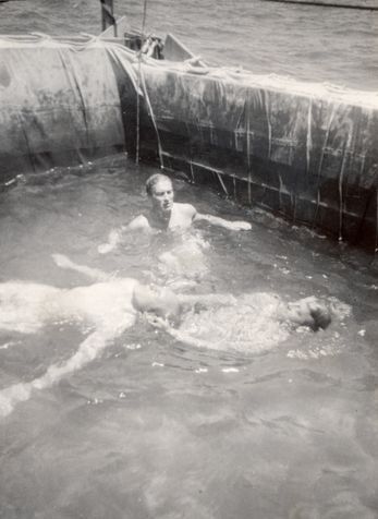 On the “Thorshammer”, a pool was rigged up on deck from a sail. Erling Sivertsen and Sevrin Skjelten’s cabin was nicknamed “the crematorium”, so a refreshing dip was most welcome on hot days. Here they are using the opportunity to practise their life-saving skills.