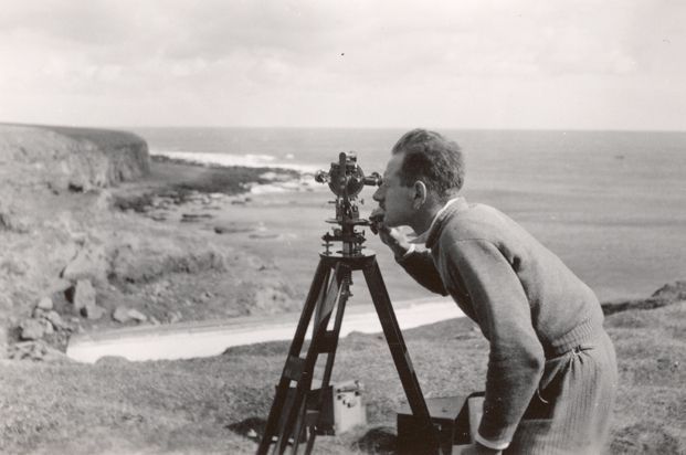 The surveyor Crawford looking through a tachymeter