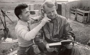 Time to spruce up a bit! Eggesvik cutting Sivertsen’s hair. Soon time to head home, perhaps?